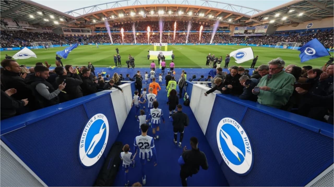 Players walking out at the Amex Stadium